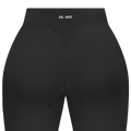Short gainant femme FL-FIT noir vue de dos, taille haute, compression moyenne, ceinture large, finitions plates anti-frottement, logo FL-FIT orange brodé au bas du dos centré, fond blanc
