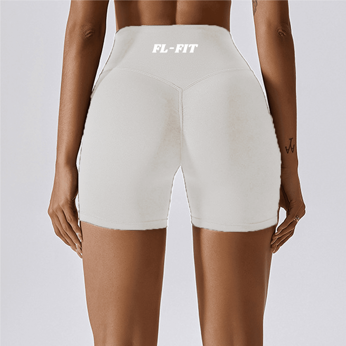 Femme portant un short Legging gainant blanc FL-FIT pour femme fitness