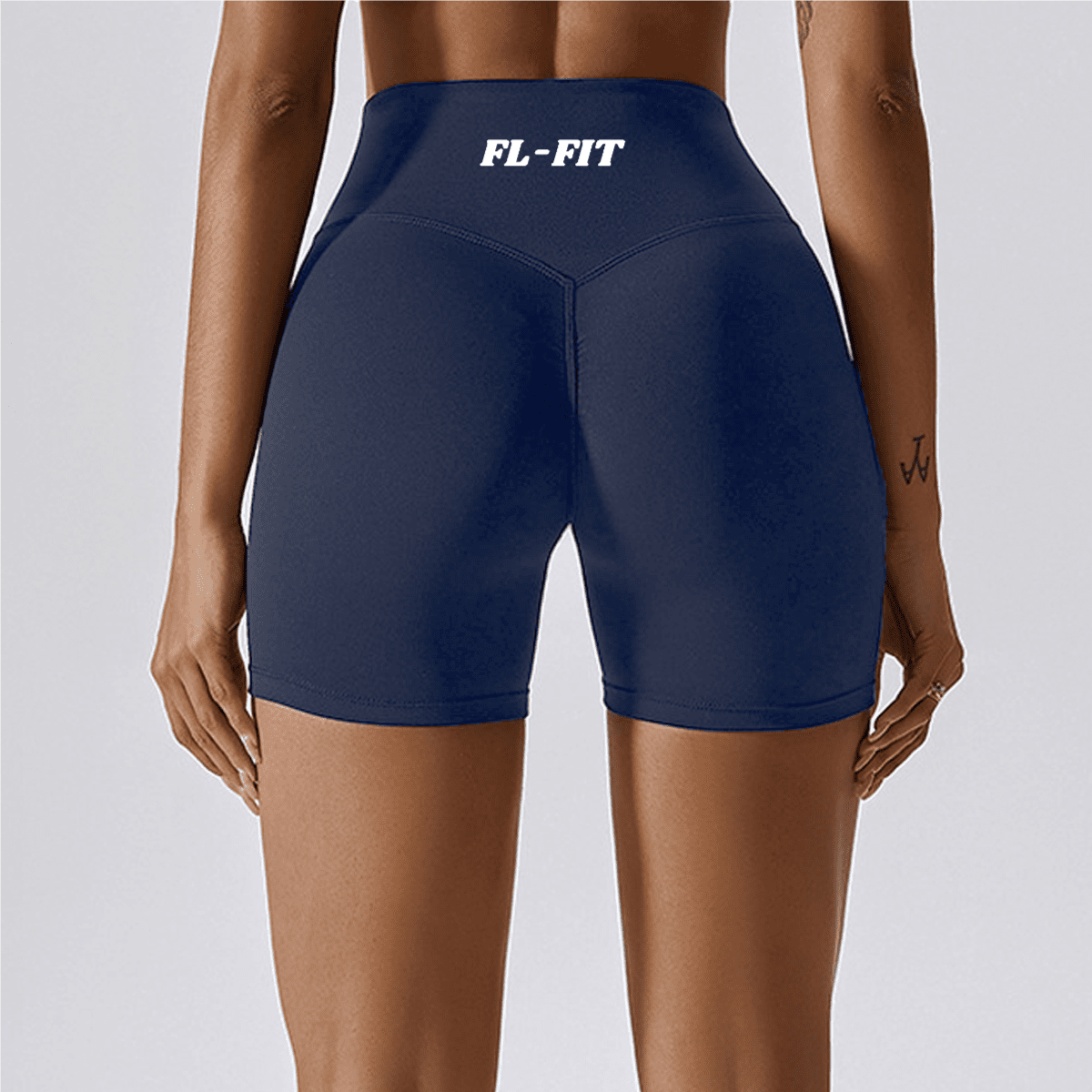Femme portant un short Legging gainant bleu roi FL-FIT pour femme fitness