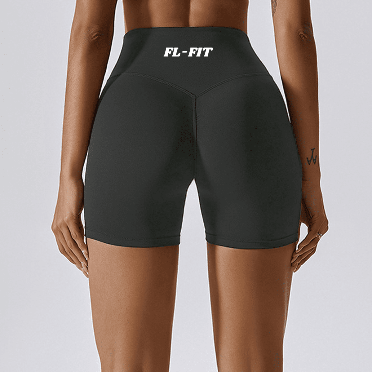 Femme portant un short Legging gainant gris FL-FIT pour femme fitness