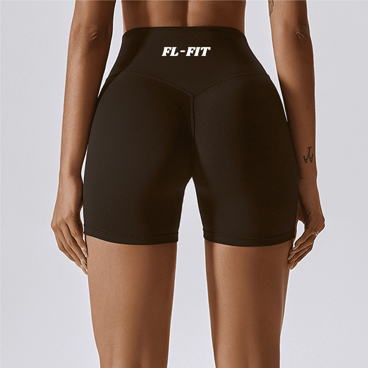 Femme portant un short Legging gainant marron FL-FIT pour femme fitness