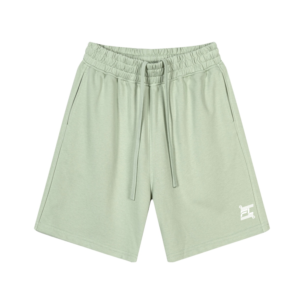 Short en coton vert clair avec taille élastique, longs cordons et poches latérales